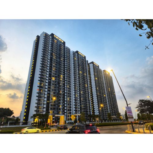 High-rise apartment tower at dusk
